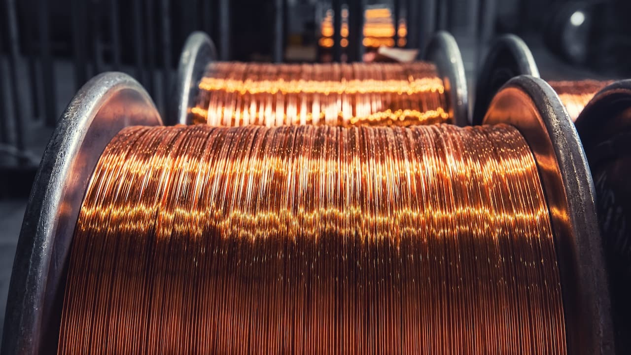 Copper wire cable production in coils, metal steel industrial plant.